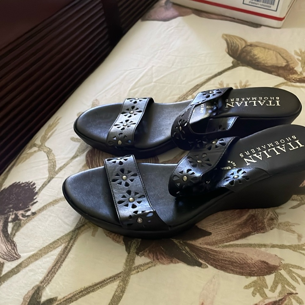 Black leather sandals with silver studs